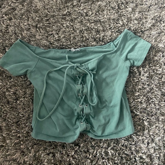 Charlotte Russe Tops - Green crop top with tie up middle